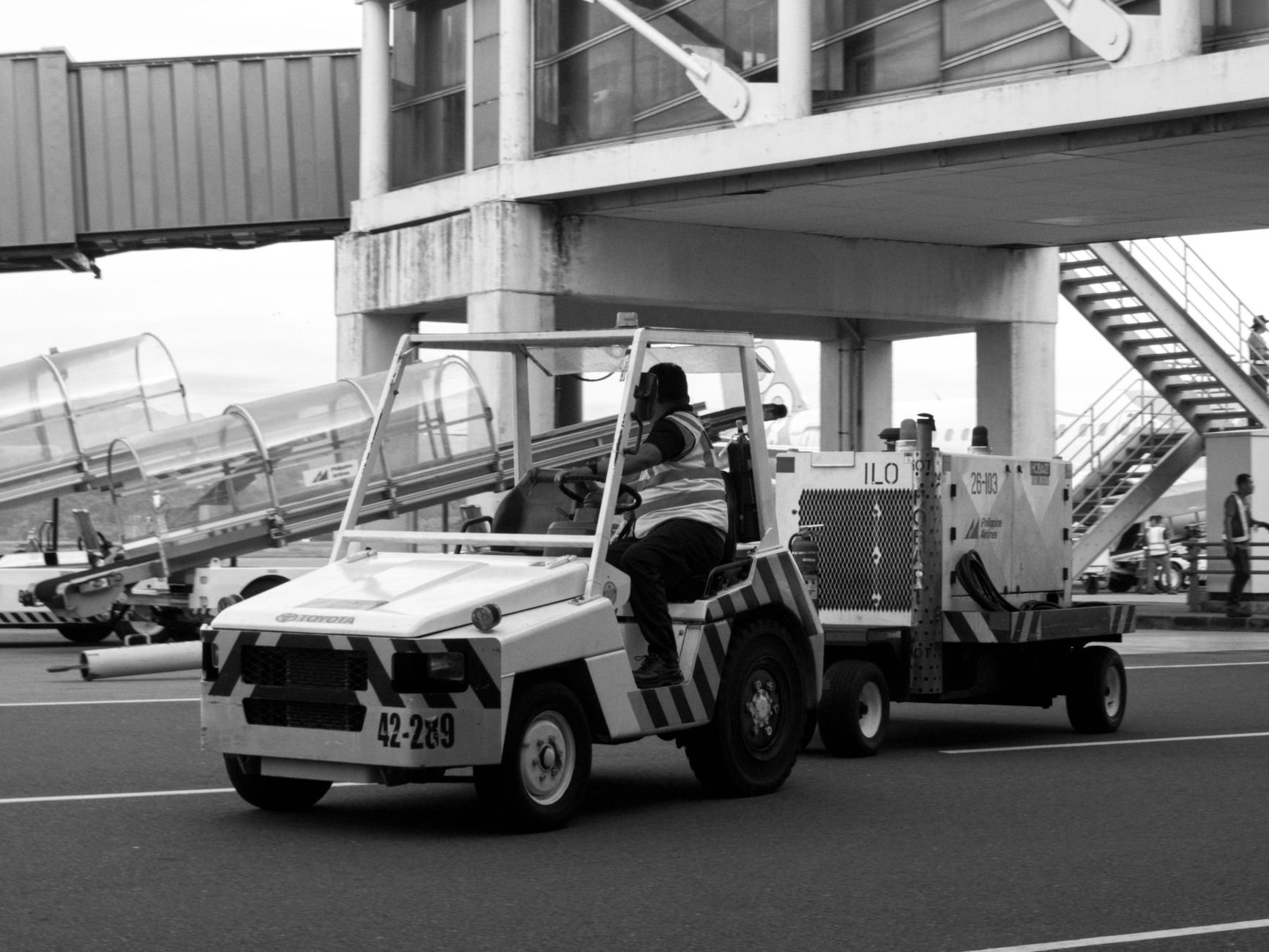 Airport ground operations with tug vehicle on tarmac